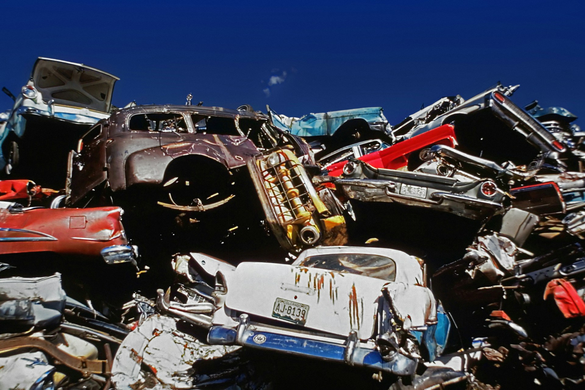 A pile of cars sold for scrap, cash for cars