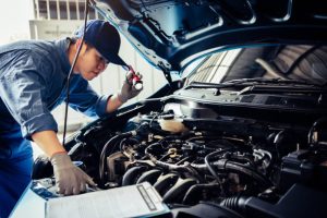 LTA car inspection guide: When, where, and how often you need to go Man inspecting car, car service
